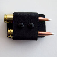 2 Round Quiver for 6mm, 6.5 & .308 Calibers.  Attach to rifle near ejection port by dual lock velcro, two round holder